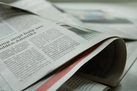The open newspaper Stock Photos