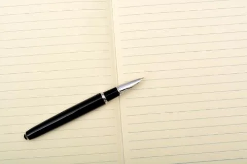 Open note book diary with pen isolated Stock Photos