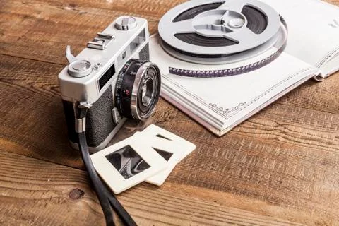 Open Notebook and Camera Stock Photos