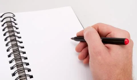 Open notebook and hand with marker Stock Photos