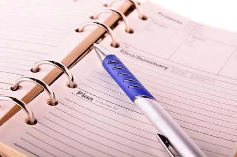 Open notebook and pen Stock Photos