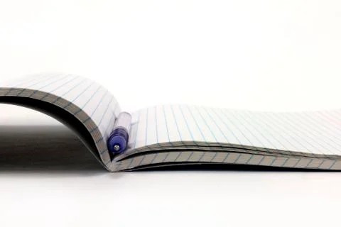 Open notebook and pen on white background Stock Photos