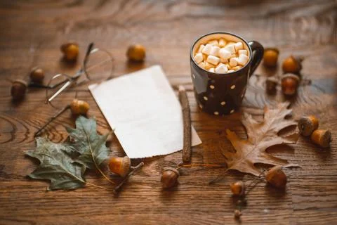 Open notebook with blank page, coffee cup, pen, chocolate hearts Stock Photos