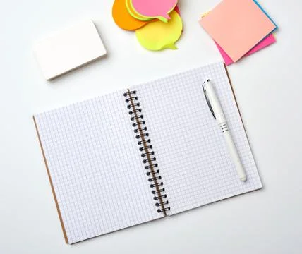 Open notebook with blank white sheets, color stickers and rectangular busines 스톡 사진