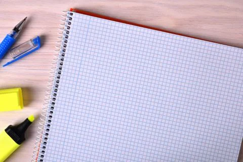 Open notebook checkered to the right of the frame top 스톡 사진