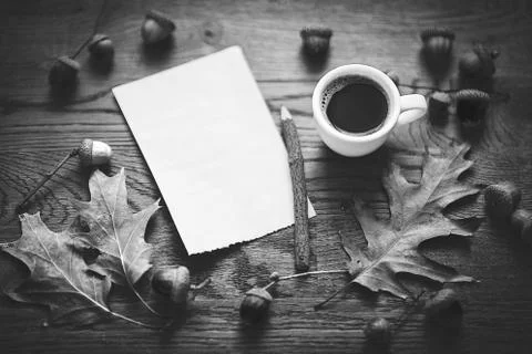Open notebook, coffee cup background Stock Photos