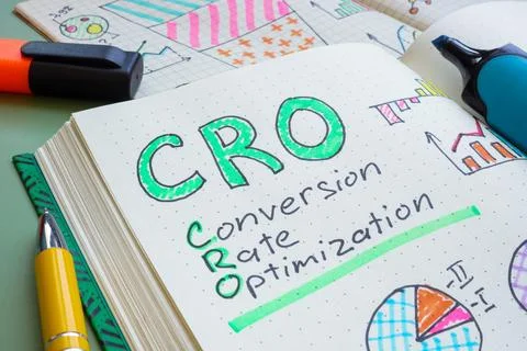 Open notebook with CRO Conversion rate optimization. Digital marketing strate Stock Photos