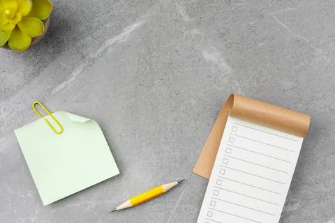 Open notebook on gray marble background. Foto stock