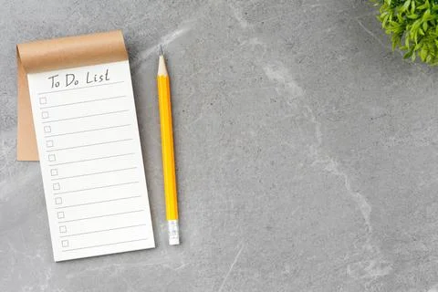 Open notebook on gray marble background. Foto stock