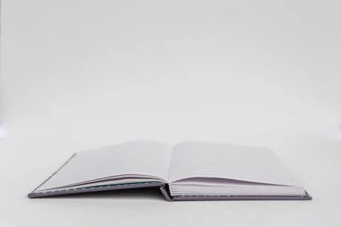 Open notebook isolated on white for background. Business, education, school, Stock Photos