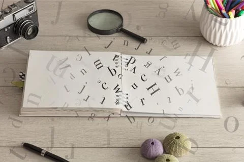 Open notebook with letters on it Stock Photos