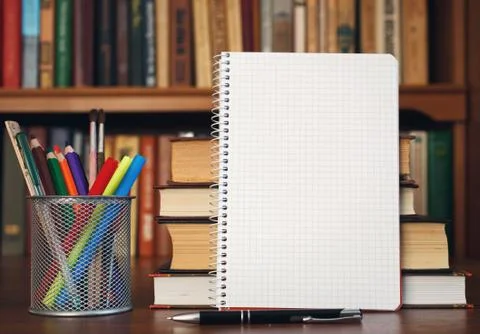 Open notebook in the library Stock Photos