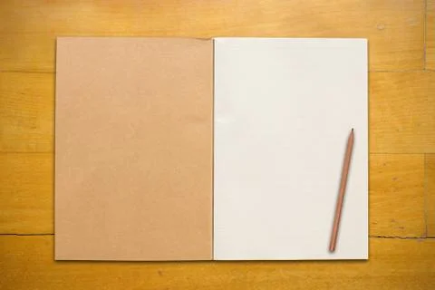 Open notebook with pencil Stock Photos