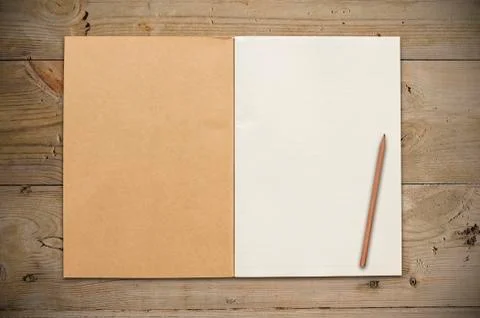 Open notebook with pencil Stock Photos