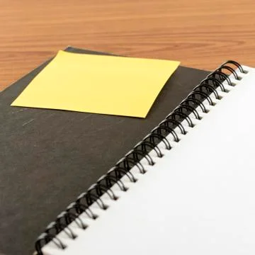 Open notebook with post it Stock Photos