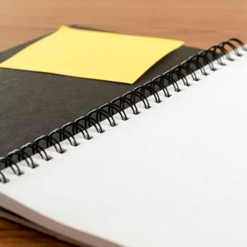 Open notebook with post it Stock Photos