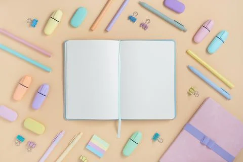 Open notebook with space for your text with pastel color stationery Stock Photos