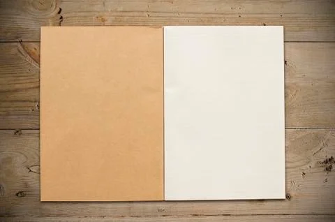 Open notebook on table Stock Photos