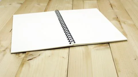 Open notebook on the table Stock Photos