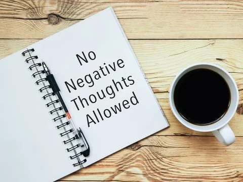 Open notebook with text "No Negative Thoughts Allowed" Stock Photos