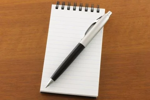 Open notepad and pen Stock Photos