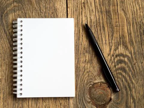 Open notepad with a clean white page Stock Photos