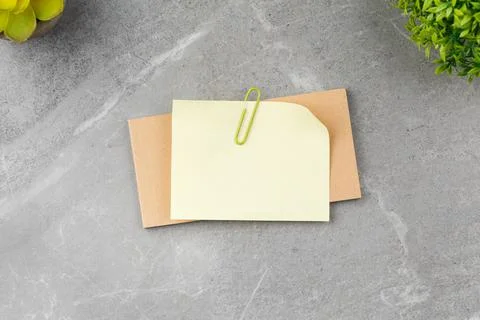 Open notepad on gray marble background Stock Photos