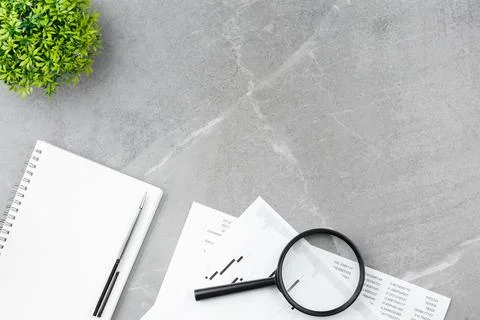 Open notepad on gray marble background Stock Photos