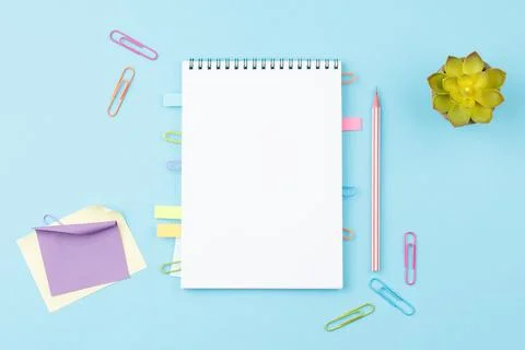 Open notepad with stationery. Office tools. Stock Photos