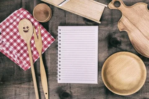 Open notepad with wooden kitchen objects open notepad with wooden kitchen ... Stock Photos