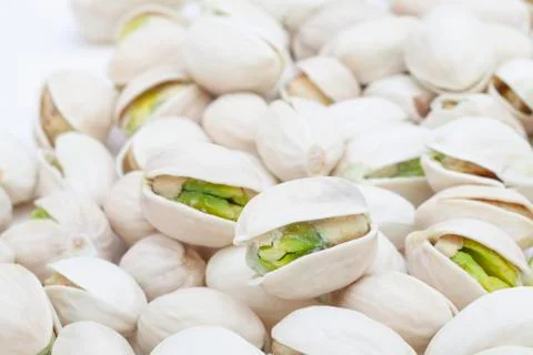 Open nuts on the table with clean and bright background Stock Photos