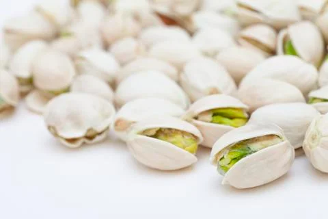 Open nuts on the table with clean and bright background Stock Photos