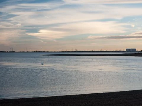 Open ocean space beach outside sun set sky surface landscape Stock Photos