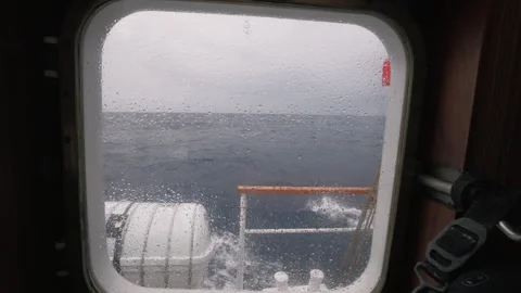 Open Ocean Through Rain Covered Ship Window Stock Footage 331991837