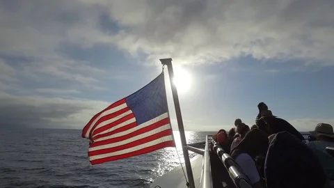 Open ocean with usa flag Stock Footage