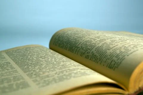 Open old book text close-up Stock Photos