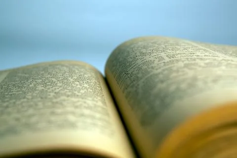 Open old book text close-up Stock Photos