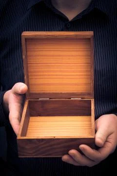 Open old box hands man Stock Photos