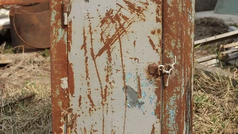 Open the old safe. Rusty safe. Opening the safe with your hands. Stock Footage 129410919
