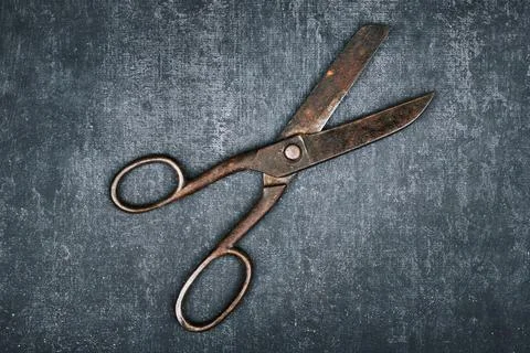 Open old tailor shears on gray background, close up Stock Photos