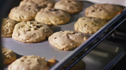 Open Oven Looking at Chocolate Chip Cookies to if There Done, 4K Stock Footage 57298577