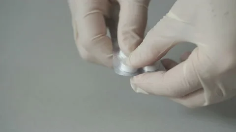 Open the pack of medicines. Stock Footage 154942033
