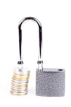 Open a padlock and a stack of coins Stock Photos