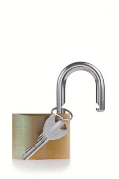 Open padlock with key on a white background Foto stock