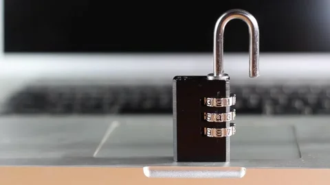 Open padlock on laptop. computer security concept. hacker Stock Footage 228649905