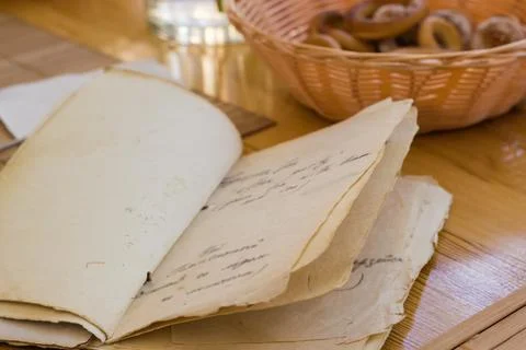 Open paper menu with blurred text stylized antique in cafe Stock Photos