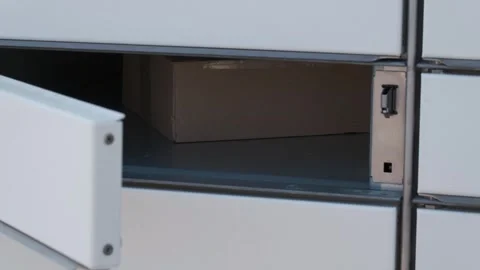 Open Parcel Locker With Package Ready for Pickup  Stock Footage 335889347