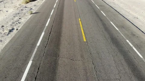 Open Paved road through the desert Vídeos de archivo 166663578