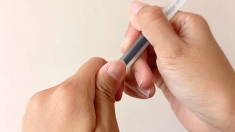 Open up a pen with a white background Stock Footage 145561250