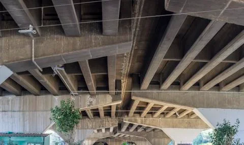 Open perspective shot of empty under highway road  Stock Photos